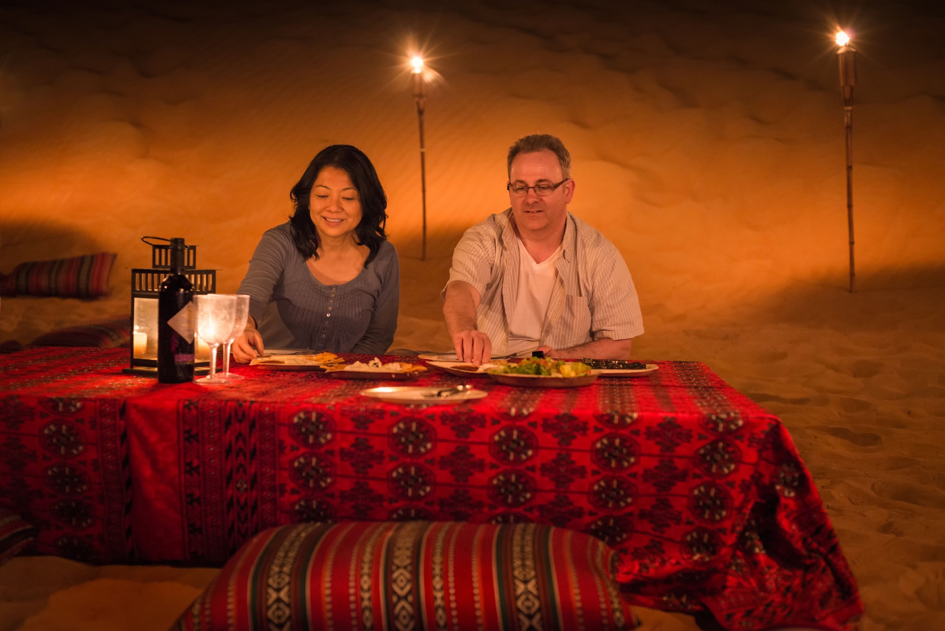 Luxury Travel, Mature Couple Eating Dinner, Desert Camp, Dubai, UAE